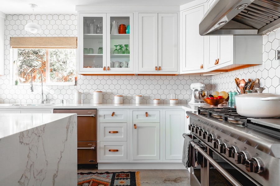 Renovated kitchen with hex-tile backsplash and marble island